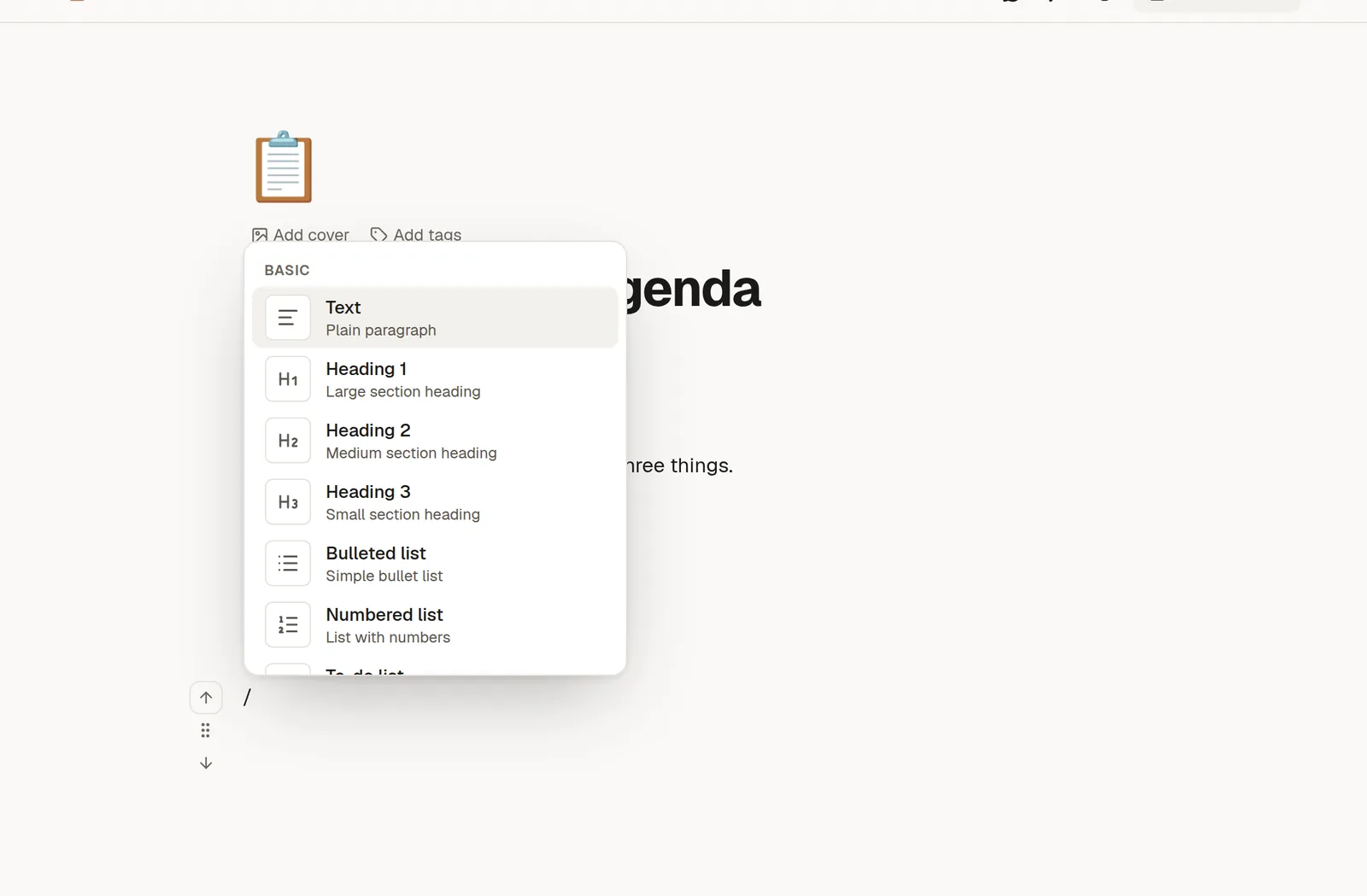 The slash menu open on an empty line in the editor